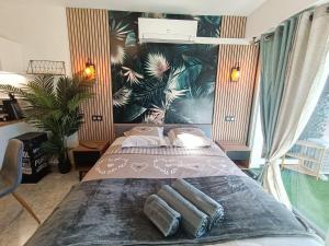 Ένα ή περισσότερα κρεβάτια σε δωμάτιο στο Léman Holidays - Le Palm +8 φωτογραφίες