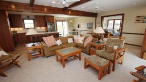 a living room filled with furniture and a kitchen at Semi-Oceanfront, Close to Beach, Dogs Welcome, SA8, Berry in Sanderling