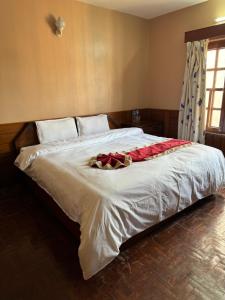 Postelja oz. postelje v sobi nastanitve Boudha Dungkar guest house