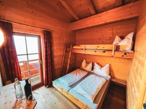 Letto o letti in una camera di Die Acherberg Alm
