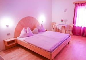Letto o letti in una camera di Garni Tschutscherhof