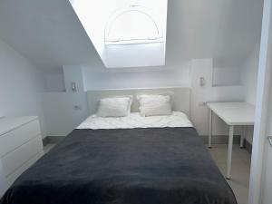 Ένα ή περισσότερα κρεβάτια σε δωμάτιο στο Parque Santiago II , renovated, ocean view, heated swimming pool ! +14 φωτογραφίες