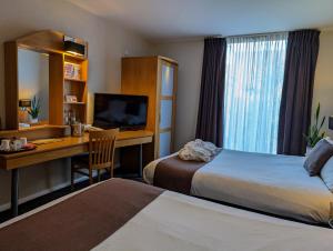 Postel nebo postele na pokoji v ubytování Future Inn Bristol