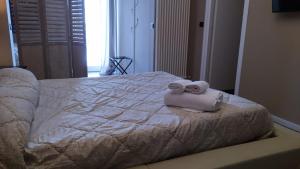 Postel nebo postele na pokoji v ubytování CconfortHotels R&B Cavour