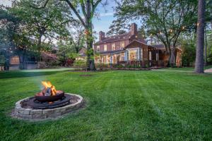 a fire pit in a yard in front of a house at The Houstonian Hotel, Club & Spa in Houston