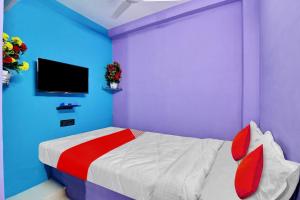 Voodi või voodid majutusasutuse OYO Flagship 80935 Hotel Rm Inn toas