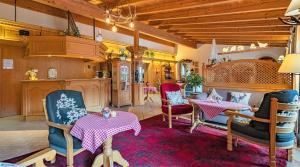 Posezení v ubytování DEVA Achentaler Vitalhotel