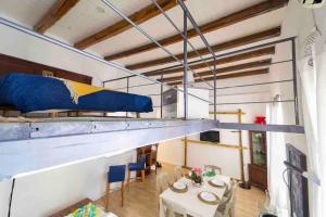 a room with a bunk bed on a shelf at Archimede Suite Apartment - Morici Street in Palermo
