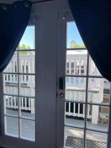 a view of a building from a window at The Garden House in Key West