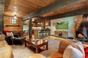 a living room filled with furniture and a fireplace at West Vail Interlochen Condo B8 in Vail
