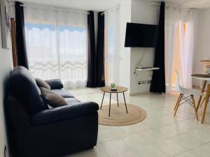 TV a/nebo společenská místnost v ubytování Un Posto al Sole
