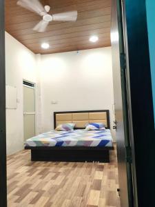 Cama o camas de una habitación en Hotel Amrit shree
