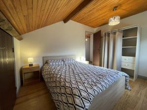 Ένα ή περισσότερα κρεβάτια σε δωμάτιο στο Chalet 1 lalanne