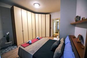a bedroom with a large bed in a room at -New- Apartment Nara -Heart of Opatija- in Opatija