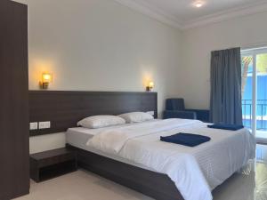 Letto o letti in una camera di Morjim Sunset Hotel
