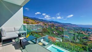 a living room with a view of a city at Villa Obra-Prima by LovelyStay in Funchal