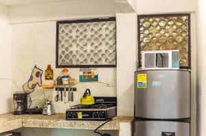 Η κουζίνα ή μικρή κουζίνα στο Casa Blanca - Taganga +59 φωτογραφίες