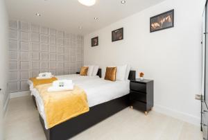 Giường trong phòng chung tại Modern One Bed Flat Lowestoft
