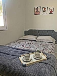 Säng eller sängar i ett rum på Apartamento próx a uopeccan
