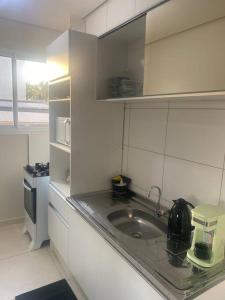 Kuchyň nebo kuchyňský kout v ubytování Apartamento próx a uopeccan
