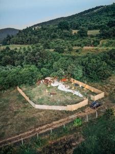 an aerial view of a house in a field at Loya Bungalov İznik in İznik