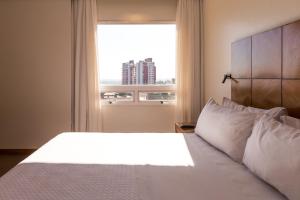 Кровать или кровати в номере Crowne Plaza Asunción by IHG