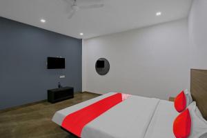 Ліжко або ліжка в номері OYO Flagship 81093 Aroma guest House