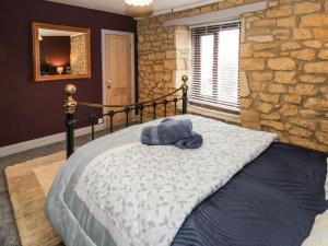Postel nebo postele na pokoji v ubytování Bow Cottage