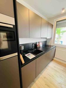 Kuchyň nebo kuchyňský kout v ubytování Schöner Wohnen im Stadtkern