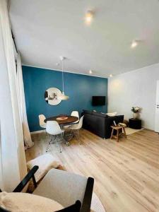 TV a/nebo společenská místnost v ubytování Schöner Wohnen im Stadtkern