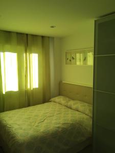 En eller flere senge i et værelse på Área Nevada 22