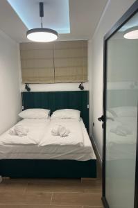 Een bed of bedden in een kamer bij Apartman Bor