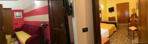 A bed or beds in a room at Actor Hotel