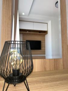 TV a/nebo společenská místnost v ubytování Perla Lux 2 Apartments