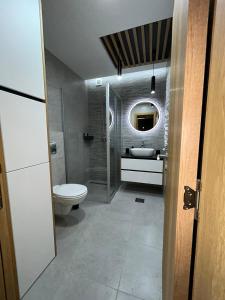 Koupelna v ubytování Perla Lux 2 Apartments