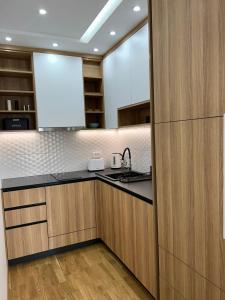 Kuchyň nebo kuchyňský kout v ubytování Perla Lux 2 Apartments