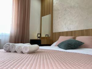 Postel nebo postele na pokoji v ubytování Perla Lux 2 Apartments