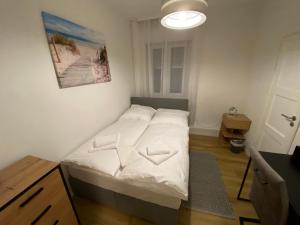Postel nebo postele na pokoji v ubytování Swan Rooms