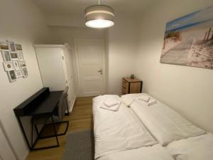 Postel nebo postele na pokoji v ubytování Swan Rooms