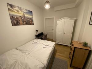 Postel nebo postele na pokoji v ubytování Swan Rooms