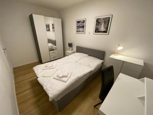 Postel nebo postele na pokoji v ubytování Swan Rooms