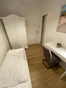 Postel nebo postele na pokoji v ubytování Swan Rooms