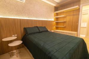 Postel nebo postele na pokoji v ubytování Terrazzo 508A - Apartamento 02 quartos - Acomoda até 05 pessoas - À poucos metros da praia de Bombas - (Consultar serviços de roupa de cama e banho) + 31 fotografií