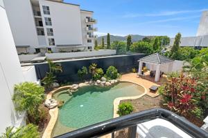 an image of a swimming pool on a building at Villa Vaucluse Apartments in Cairns