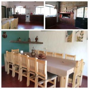 a kitchen and a dining room with a table and chairs at La Ilusión in Campos Salles