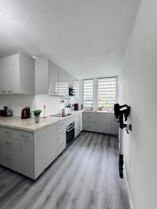 Kuchyň nebo kuchyňský kout v ubytování SAB Location - Appartement