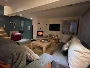 A seating area at Mountain Home / Center Arachova