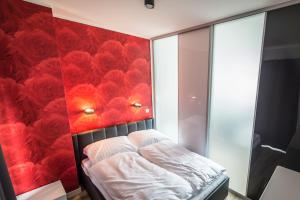 Cama ou camas em um quarto em Silver One Apartments