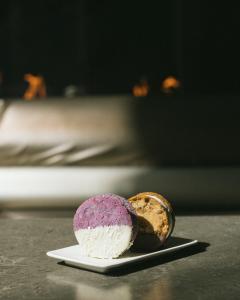 a purple and white dessert on a plate at W Seattle in Seattle