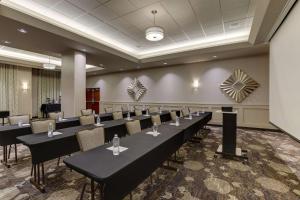 a conference room with long tables and chairs at Drury Inn & Suites Cincinnati Northeast Mason in Mason